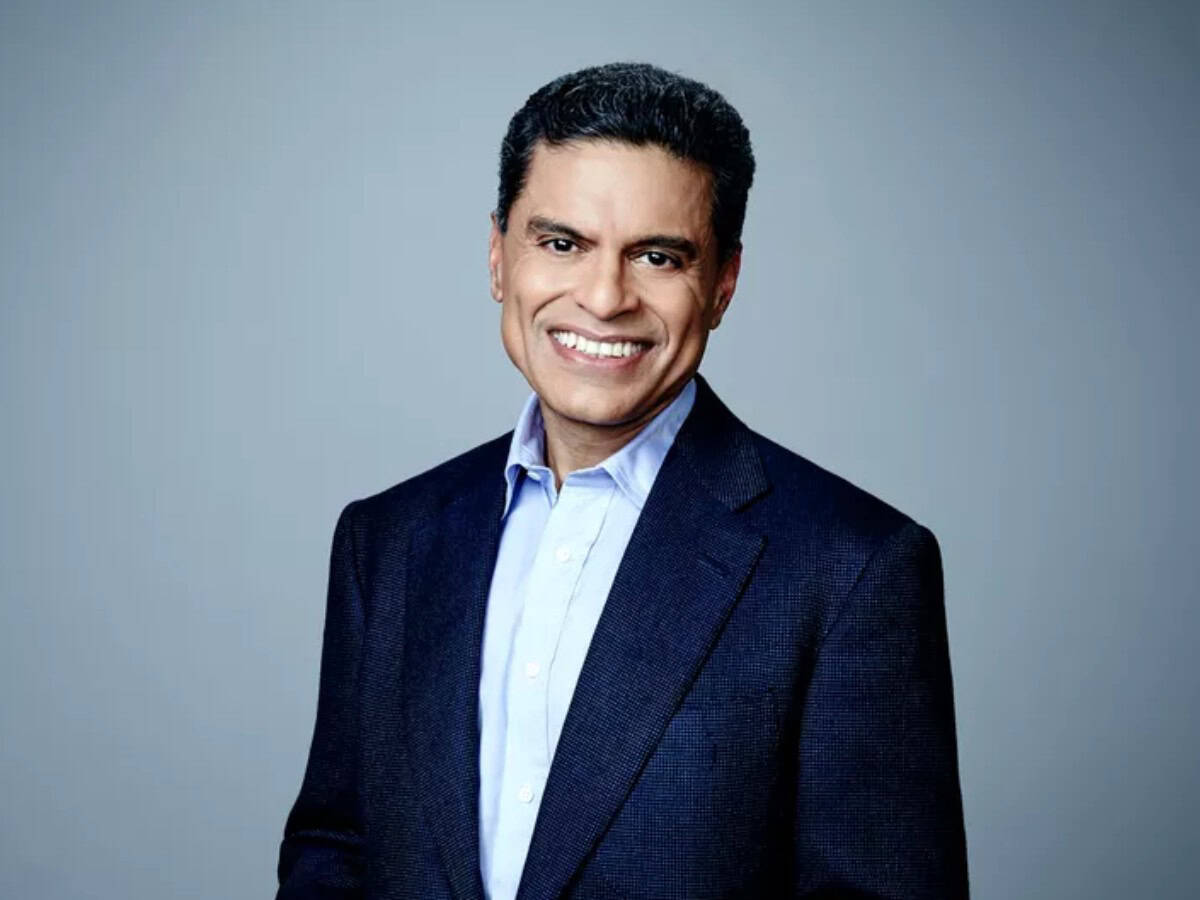 Why is Fareed Zakaria happy that his father died 15 years ago?