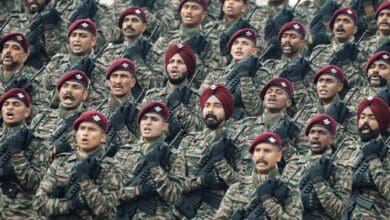 The image displays a picture of India Army officers