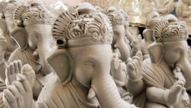 The image displays a picture of eco friendly Ganesh idols