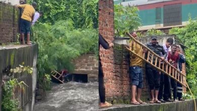 The image shows HYDRAA's disaster response team rescuing a man from Musi nala near Yakutpura rainwal station on Wednesday, August 13, 2025.