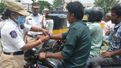 Traffic police in Hyderabad ties rakhis to helmetless drivers