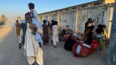 Local residents, who fled their homes following border clashes between Pakistan and Afghan forces wait for transportation in Chaman a town on the Pakistan side of the Afghanistan border (PTI)