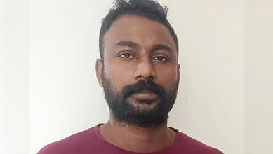 Portrait of Shameem KK, the accused, standing against a plain background.