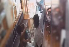 woman slapped for throwing chilli powder at shopkeeper