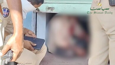 Nagesh sits inside the tea shop