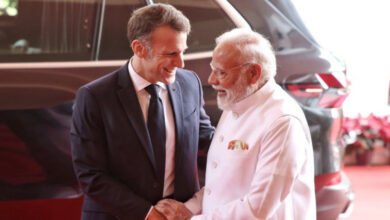 Prime Minister Modi shakes hands with French President Emmanuel Macron in Mumbai on February 17.