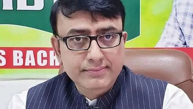 Man speaking at protest against Imam assault in Hyderabad.