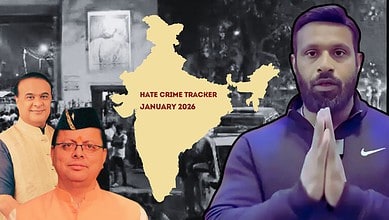 Man praying with a map of India highlighting hate crime statistics for January 2026.