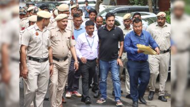 An Assam Police team and others leave the Delhi residence of Congress leader Pawan Khera after questioning in connection with a case linked to allegations made against Assam Chief Minister Himanta Biswa Sarma and his family, in New Delhi, on Tuesday, April 7.