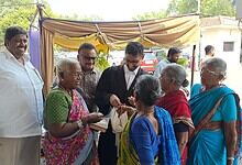The image shows the senior citizens celebrating after they received R&R benefits for alienating their lands for the construction of Mallanna Sagar Reservoir under the Kaleshwaram Project on Tuesday, April 14, 2026.