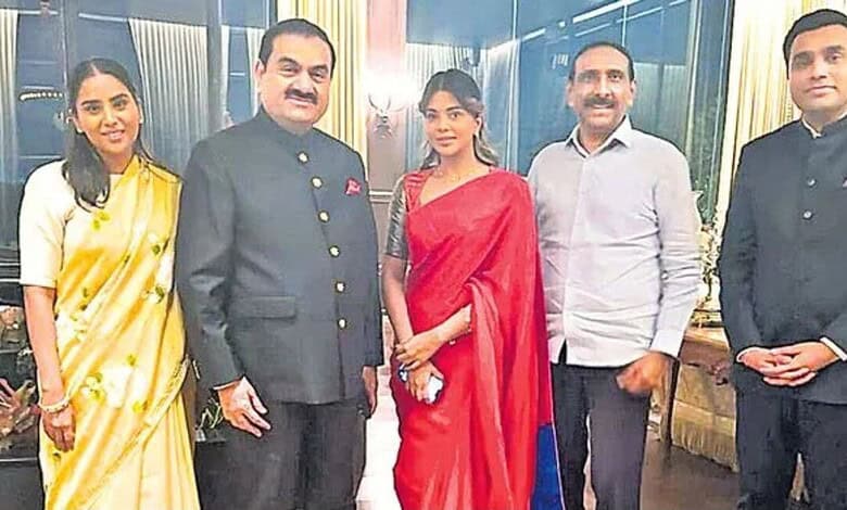 The ED money laundering case accused Boinpally Srinivas Rao seen with Gautam Adani from an old file picture.