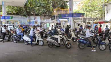 Motorists queue up to refuel their vehicles at a petrol pump amid reports of fuel shortage following a recent increase in petrol prices,