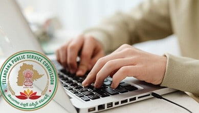 Close-up of hands typing on a laptop with Telangana Public Service Commission logo in the background.