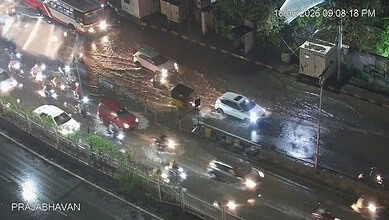 Hyderabad traffic halted due to heavy rain, causing congestion and delays on roads.
