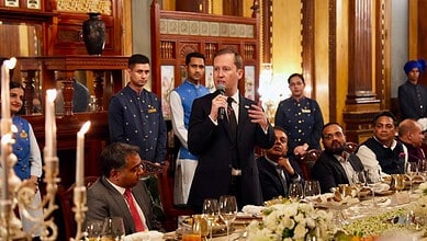 US envoy speaking at a formal dinner event at Taj Falaknuma, Hyderabad.