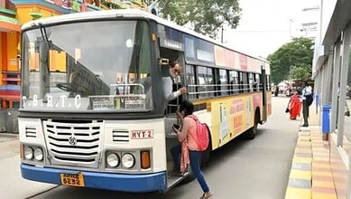 passengers board a TGSRTC bus in Hyderabad