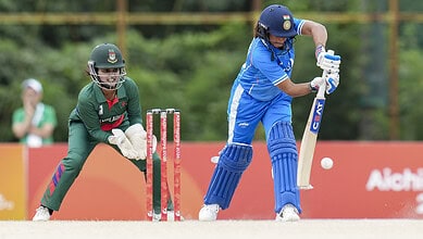 Indian female cricketer batting against Bangladesh in a cricket match at the Asian Games.