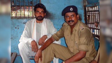 The Odisha government has rejected a plea of Hindutva activist Dara Singh for premature release from prison in the murder of Australian missionary Graham Staines and his two minor sons in Keonjhar in 1999, Singh is seen along with a police official in a former image, Tuesday, Sept. 15, 2026. (PTI Photo)