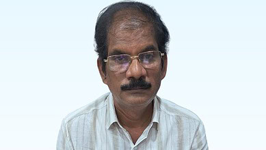 Suryapet town planning officer in formal attire with glasses and mustache.