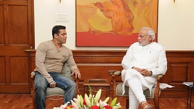 Salman Khan and Prime Minister Narendra Modi in a formal meeting setting.