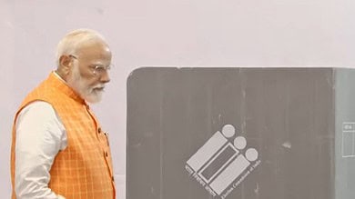PM Modi votes at polling booth in Gandhinagar Lok Sabha constituency