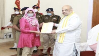 Shah hands over appointment letters to kin of martyred J&K cops