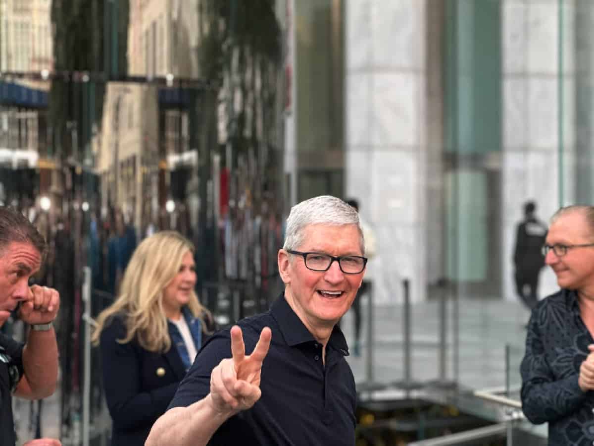 Tim Cook greets first iPhone 14 buyers at iconic NY store