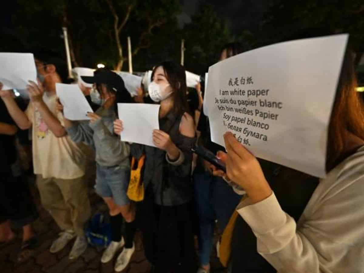 Chinese universities send students home after protests