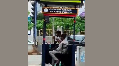 Video of men boozing in traffic booth at Hitech drives attention