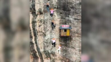 Watch: Convenience store hangs on cliff side at 393 feet in China