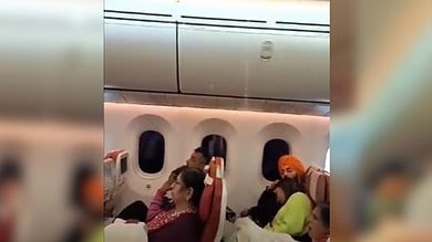 Watch: Water drips from overhead bins in Air India flight; passengers stunned