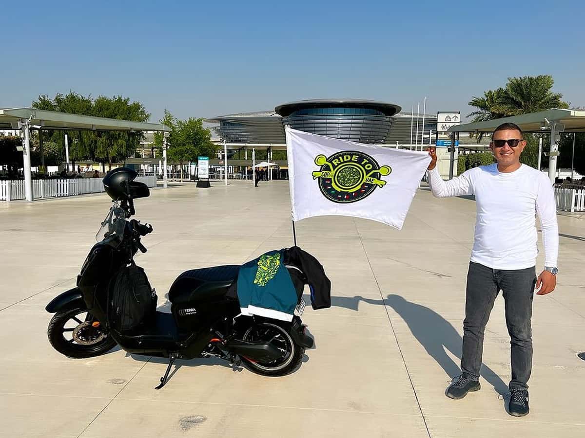 World record holder rides electric motorcycle from Egypt to Dubai for COP28