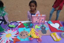 A girl child of Aman Vedika showcases their art and craft models at the concluding ceremony of their summer camp at Musheerabad Government High School last week.
