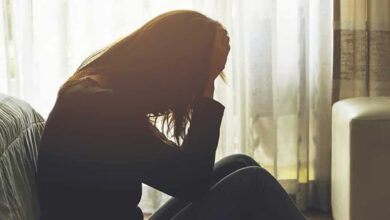 Upset teenage girl sitting alone, representing Hyderabad girl who ran away after parental scolding.