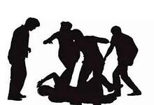 Representational Image of group of people thrashing a man