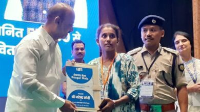 The image displays a picture of Bandi Sanjay giving away joining letters to new recruits at the Rozgar Mela in Hyderabad
