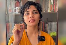 The image displays a picture of folk singer Neha Singh Rathore