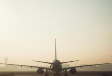 An aircraft on a runway ready to take off from an airport for airport in Telangana story.