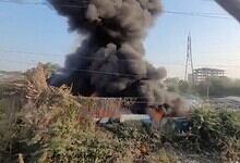 Smoke coming out of the dump yard near Musi river