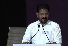 Revanth Reddy delivering a keynote speech at the AI Summit Delhi, focusing on technology and innovation.