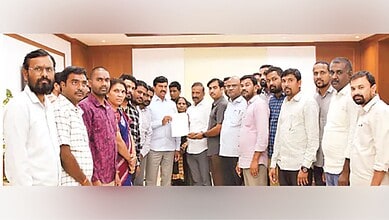 Group of journalists and editors at Siasat Daily meeting.