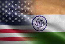 US and India flags with joint statement, trade agreement theme.