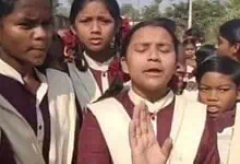 Group of students protesting water shortage at government school in Telangana.