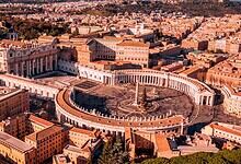Aerial view of St. Peter's Basilica and the Vatican visitor area in Rome.