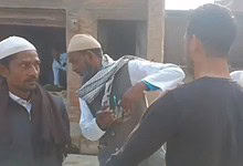 Group of men discussing an incident related to hate crime in Uttar Pradesh, India.