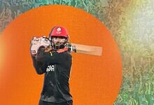Yuvraj of Canada preparing to bat, inspired by Indian cricket heroes.