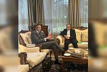 Iranian Foreign Minister and UN nuclear agency chief in Geneva discuss nuclear negotiations.