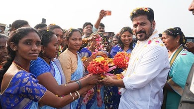 Image showing Telangana CM Revanth Reddy interacting with the public.