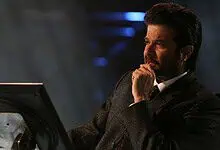 Anil Kapoor attending a film event, showcasing his style and presence in the entertainment industry.