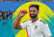 Auqib Nabi celebrating with cricket ball, highlighting his fast bowling talent for Indian cricket team.